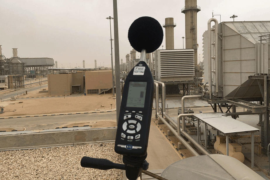 A sound level meter at an industrial site
